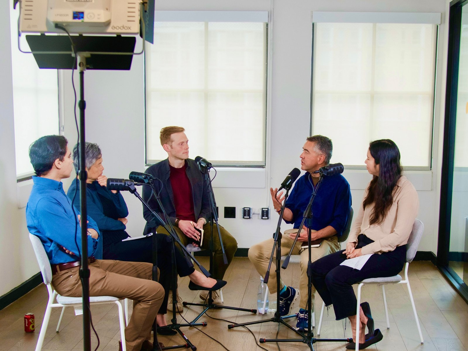 Team members recording a story interview