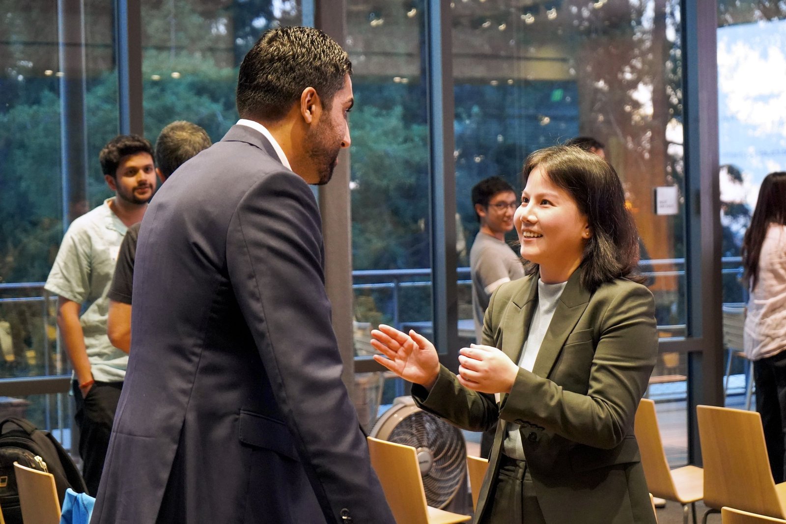 Two attendees in conversation at the Edge Medicine Innovation Launch at UC Berkeley